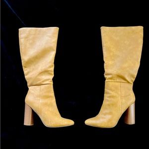 Faux leather tan calf boot. Lightly worn. Size 7.5.